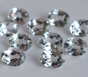 บุษราคัมสีขาวธรรมชาติทรงรีตัดขนาด10x12มม. เป็นรูปวงรีหลวมสีขาวบุษราคัม - Product Image 2