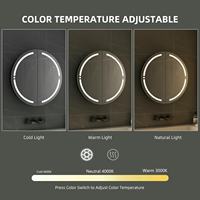Organisateur de rangement moderne à double porte Cadre en fer éclairé Système LED éclairé avec lumière Armoire ronde à miroir pour salle de bain