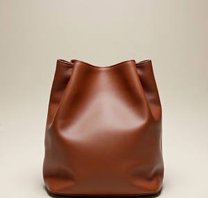 Fashionable Brown <b>Leather</b> Bucket <b>Bag</b> with Zipper Closure and Button Decoration <b>Soft</b> <b>Leather</b> Shoulder <b>Bag</b> at Best Price - Product Image 4