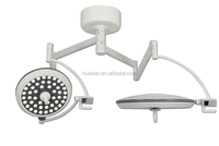 Lampe de modèle chirurgicale à double dôme électrique à LED sans ombre pour un fonctionnement optimal.