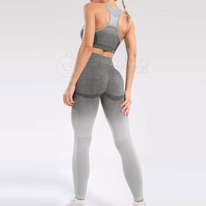 Conjunto de yoga con logotipo personalizado para mujer Nuevo diseño Traje transpirable de secado rápido con sujetador sin costuras Falda corta Mangas cortas Patrón sólido - Product Image 4