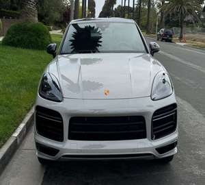 Cayenne Turbo Coupé AWD 2024, Bajo Kilometraje, Transmisión Automática, Volante a la Izquierda, Color Oscuro, Asientos de Cuero, Techo de Aleación de Aluminio - Product Image 1