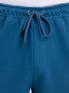 Joggers lavés à séchage rapide en éponge française bleue de haute qualité pour hommes pantalons pour hommes respirants poignets côtelés avec poche zippée - Product Image 4