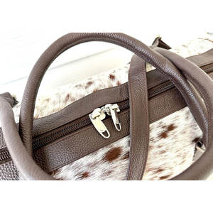 กระเป๋าเดินทางหนังวัวแท้ ดีไซน์เฉพาะ จำนวนมากรุ่นใหม่ ปี 2026  สีสันทันสมัย  หนังวัวแท้ 100%  รับสั่งทำสีตามต้องการ - Product Image 5