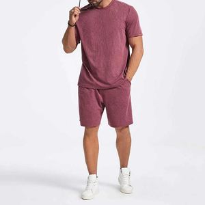 Nouvel arrivage de t-shirts d'été décontractés pour hommes, ensemble de shorts et t-shirt minimalistes surdimensionnés avec logo personnalisé, survêtements en tricot de couleur unie à col en O - Product Image 1