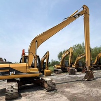 Excavatrice CAT 320BL d'occasion avec flèche longue, excellent état de fonctionnement, pour dragage, démolition et excavations profondes, vente chaude