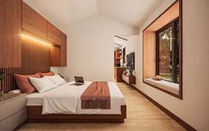 Maisonnette modulaire moderne avec un extérieur en lattes de bois, un porche avant couvert et un toit en pente. - Product Image 5