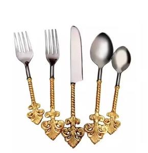 Cubiertos Juego de cubiertos de boda Cubiertos de titanio dorado Acero inoxidable Impresionante elegante Juego de cubiertos de mesa de boda de oro Suministros a granel - Product Image 1