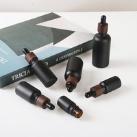 Vente en gros de flacons compte-gouttes en verre givré noir mat de 15 ml, 20 ml, 30 ml, 50 ml, 100 ml, 200 ml pour huiles essentielles et soins de la peau