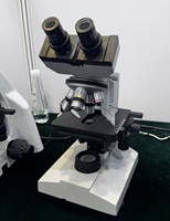 Lab Biological Microscope Teaching 40X-1600X Student Multipurpose Binocular with Abbe Condenser N.A1.25 and IP55 for School