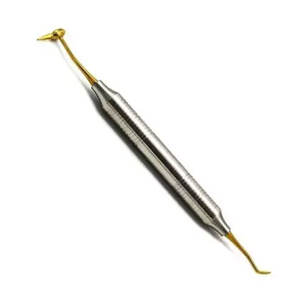 Compuesto dental #6 oro titanio CIG6 plástico relleno restauraciones instrumento - Product Image 1