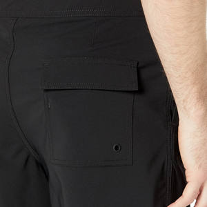 Short d'entraînement décontracté pour homme avec logo Short de gym tricoté en spandex Short de course teint en plaine pour homme été avec motif de poches - Product Image 5