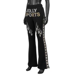 Pantalones de Mujer con Corte Acampanado, Tela de Poliéster y Elastano de Alta Calidad de 230 GSM, Color Negro, Corte Acampanado, Panel Lateral con Logotipo de Pedrería - Product Image 1