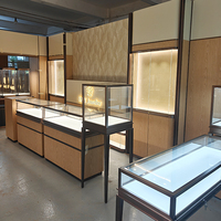 Vitrine de luxe en aluminium et verre pour téléphones portables, bijoux, cigarettes, montres, présentoir à bijoux avec éclairage LED