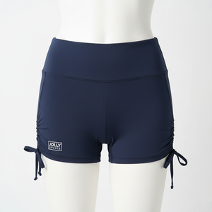 Shorts de sport pour femmes en nylon et élasthanne extensible, bleu marine, avec logo personnalisé par transfert thermique sur les côtés ajustables. - Product Image 6