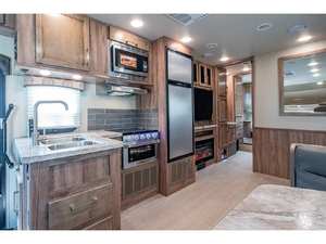 Autocaravane de luxe Odyssey 30Z 2023 d'occasion ENTEGRA COACH Euro 5 Emission Capacité 4-6 passagers Four à micro-ondes Sol en acrylique blanc - Product Image 6