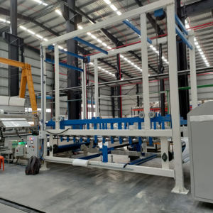 Système d'accumulation de tissu pour les lignes de revêtement textile assurant un fonctionnement continu et un contrôle précis de la tension - Product Image 1