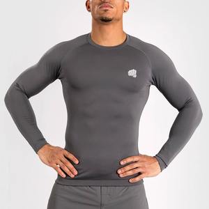 Alta calidad rendimiento personalizado MMA Rash Guard transpirable manga larga Anti-UV UPF50 suministro de fabricante Unisex a la venta - Product Image 1