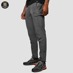 Pantalon cargo en toile à boutons, taille mi-haute, coupe décontractée unique, coupe-vent et respirant, couleur unie, disponible en toutes tailles, service OEM disponible - Product Image 1