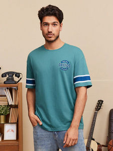 เสื้อยืดพิมพ์ลายวินเทจซักกรด/ซักแล้วทำจากผ้าฝ้ายเนื้อนุ่ม100% จากปากีสถาน - Product Image 3