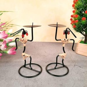 Centro de mesa de hierro para té para bodas con patrones intrincados elegancia rústica y brillo de vela romántico - Product Image 6