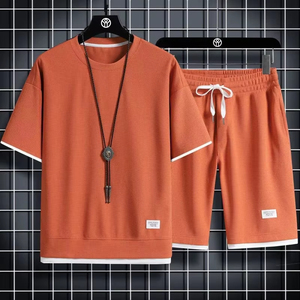 Ensemble de vêtements de sport d'été décontractés pour hommes T-shirt et short à manches courtes imprimé gaufré Taille Plus XXL Vêtements deux pièces sans couture OEM - Product Image 3
