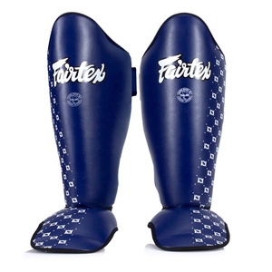 Protections de tibias durables pour Muay Thai et MMA – Protège-tibias en cuir synthétique et mousse haute densité pour le sparring et le combat de kickboxing - Product Image 1