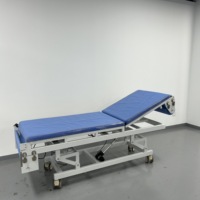 Table d'examen électrique B-Ultrasound avec fonctions de changement automatique de draps