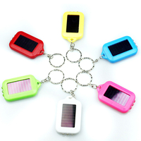 Mini énergie solaire porte-clés lampe de poche Portable lanterne torche solaire lumière LED Camping en plein air randonnée lumière de secours outil de survie