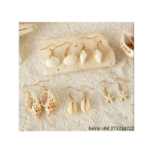 Porte-clés en coquillage fait à la main, design en corde de coquillage naturel pour la décoration de sac, souvenir, accessoires cadeaux, fabriqué au Vietnam - Product Image 1