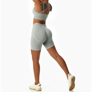 Ropa de gimnasio sin costuras con logotipo personalizado para mujer, pantalones cortos de Yoga, mallas, 2/3/4 Uds., conjuntos de sujetador Halter para entrenamiento deportivo - Product Image 1