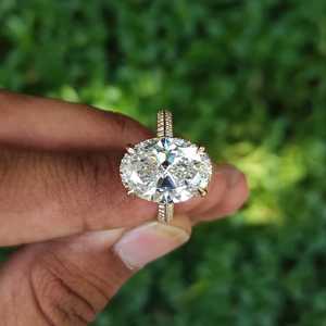 Anillo de Compromiso Ovalado de 9.40 Quilates con Diamantes Cultivados en Laboratorio, Color EF, Claridad VS, con Halo Oculto y Corte de Cuchilla, para Bodas - Product Image 1