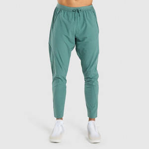 Pantalons et pantalons décontractés pour hommes en lin/coton fabriqués en usine, vente directe, séchage rapide, entraînement sportif en plein air, taille à cordon de serrage, athlétique - Product Image 1