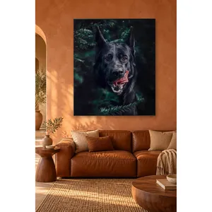 Impression sur toile de Fida, berger allemand noir avec la langue sortie de la bouche, parmi des branches de pin - Product Image 1