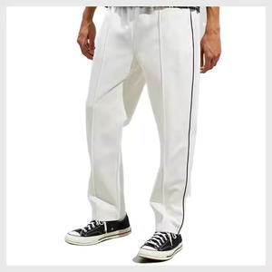 กางเกงแทร็คผู้ชายขายส่ง ดีไซน์ล่าสุด คุณภาพสูง ป้องกันรอยยับ สไตล์ลำลอง เอวกลาง ฮิปฮอป ตัดสี หลายกระเป๋า 100% - Product Image 1