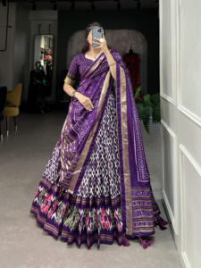 Lehenga de seda Tussar con estampado Ikkat elegante con trabajo de lámina y Dupatta de encaje Gotta para ropa de fiesta de boda compradores de suministro a granel - Product Image 3