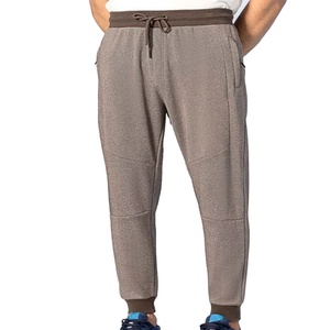 กางเกงวอร์มผู้ชายแบบมีเชือกผูกเอว ทรงลำลอง พิมพ์ลายโลโก้ ระบายอากาศได้ดี ทรงโอเวอร์ไซส์ - Product Image 1