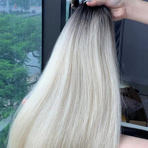 Extensions de cheveux bruts du Vietnam à prix d'usine Cheveux clairs naturels aux caractéristiques soyeuses et ondulées - Product Image 1