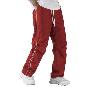 Pantalones de chándal de nailon laterales a rayas fluorescentes holgados rectos para Hombre Ropa de calle con logotipo personalizado con estilo técnico impreso - Product Image 2
