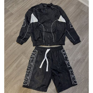 Conjunto personalizado de camisetas de algodón para hombre al por mayor tiras reflectantes cremallera con capucha pantalones cortos para correr conjuntos de algodón al por mayor - Product Image 6