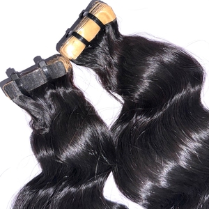 Precio al por mayor 100% cabello humano vietnamita hueso recto paquetes de color natural con cinta en - Product Image 3