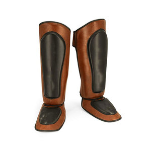 Protège-tibias en cuir réglables à prix d'usine, légers et confortables avec protection professionnelle pour le pied et le genou - Product Image 1