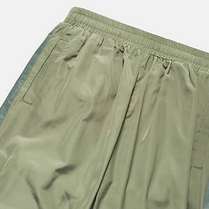 กางเกงไนลอนผู้ชายแห้งเร็ว ออกแบบมาสำหรับกีฬากลางแจ้งและคำสั่งซื้อส่งออกจำนวนมาก ปี 2026 - Product Image 3