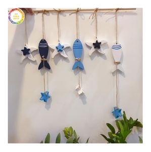 Recuerdo de pescado de madera de Vietnam Proveedor de exportación al por mayor a granel para festivales Tiendas culturales y compradores internacionales de regalos - Product Image 1