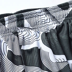 กางเกงบาสเก็ตบอลแบบยูนิเซ็กซ์ โพลีเอสเตอร์ 100% คุณภาพสูง สวมใส่สบาย น้ำหนักเบา ขนาดสั่งทำได้ ระบายอากาศ แห้งเร็ว MOQ ต่ำ - Product Image 3