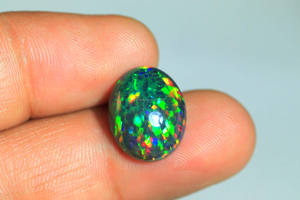 โอปอลทรงหลังเบี้ยสีดำโอปอลทรงวงรีสีดำสำหรับทำเครื่องประดับอัญมณีโอปอลสีดำขัดเงาเรียบ8-10Carat ขนาดใหญ่ - Product Image 6