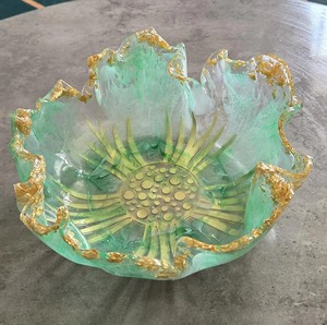 Modern Green Resin Bowl with Glossy Gold Surface Decorative Centerpiece for Table Display in Home Living Room or Office - Product Image 1