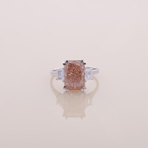 IGI Certified Radiant Cut Peach Pink Lab Diamond Three Stone <b>Ring</b> with Trapezoi Side Diamonds in 9K White/Rose/Yellow Gold - Product Image 1