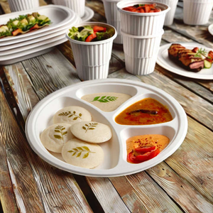 Assiettes jetables écologiques en bagasse biodégradable à 4 compartiments, rondes de 11x4 pouces, pour la restauration, les mariages et les événements - Product Image 1