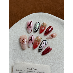Crimson Wings Press-On Nail Art: Elegante design ad ala per l'arricchimento delle unghie - Product Image 2